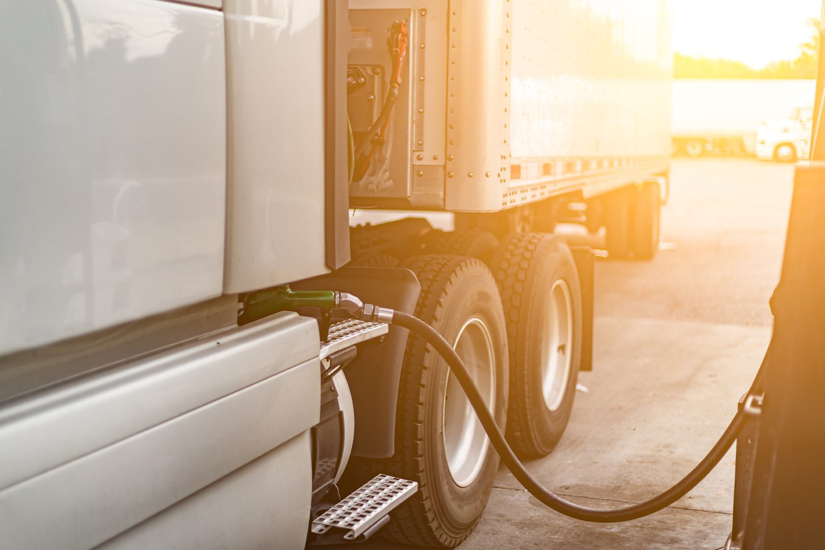 Semi-truck on gas station. Truck fueling